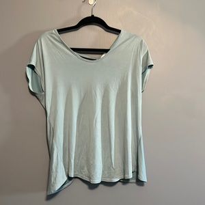 Light blue tee with open back